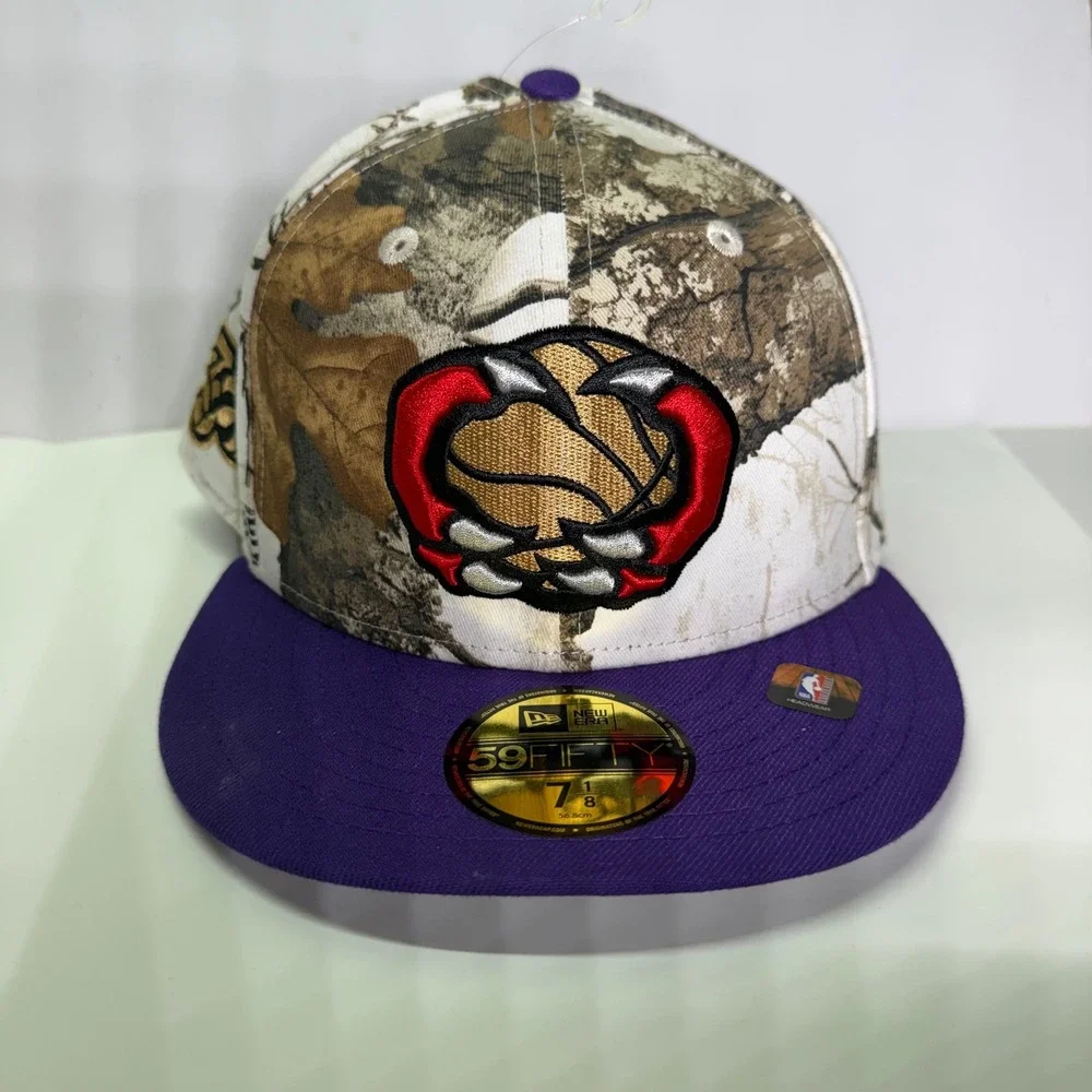 New Era Toronto Raptors Hat Mens 7 1/8 Purple RealTree Camo 59FIFTY Fitted NBA